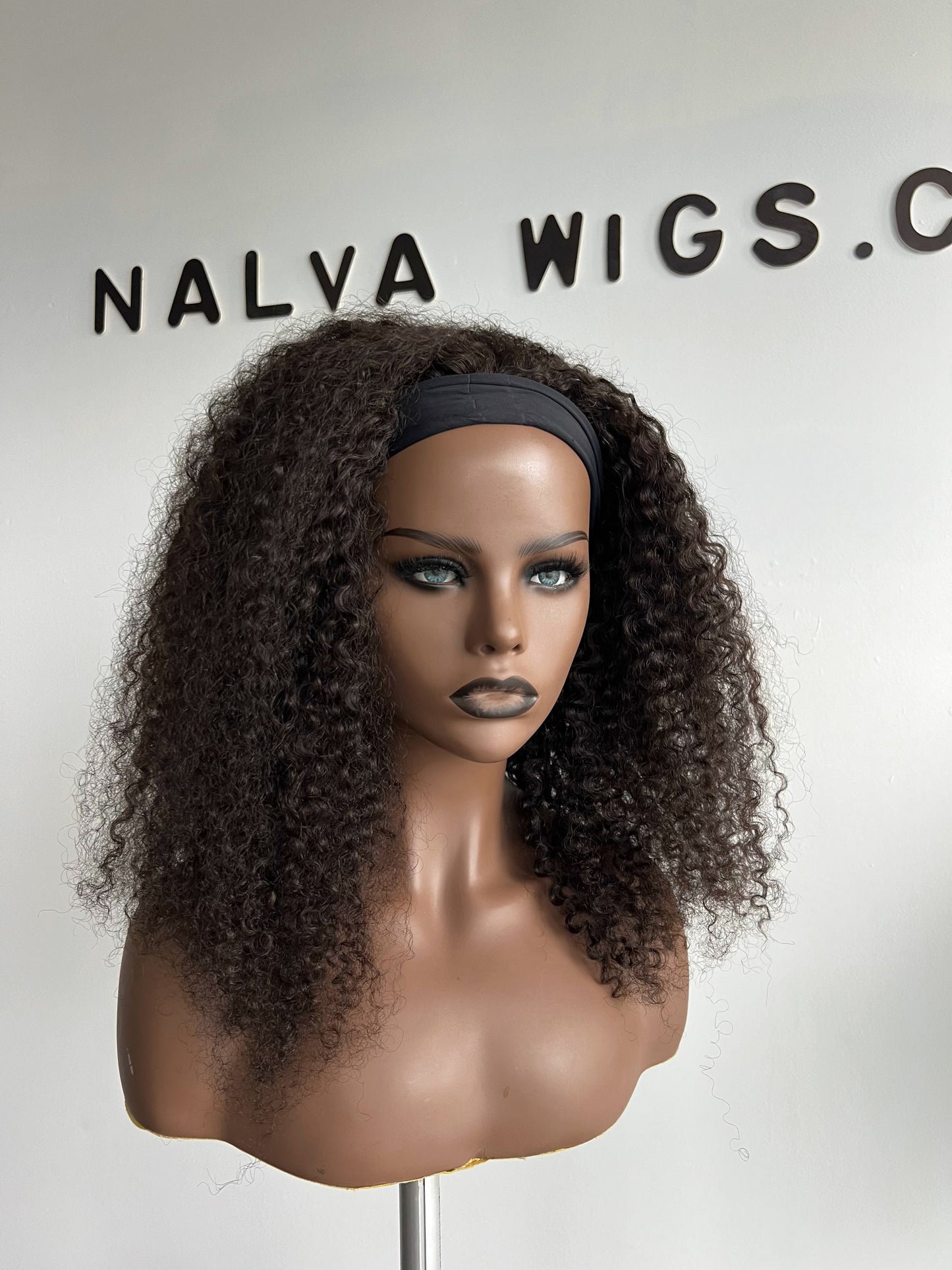 Curly Headband or Band fall wig with medium density. Light weight and beginner friendly with a built-in Spandex Headband, 2 combs, in-built adjustable elastic band and a breathable wig cap. 18" Long, Natural Dark Brown, Spandex Headband, 180% Density, Premium Virgin Human Hair. Mississauga, Ontario