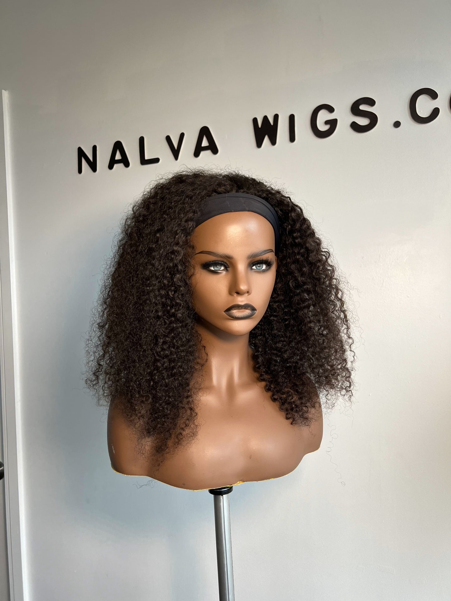 Curly Headband or Band fall wig with medium density. Light weight and beginner friendly with a built-in Spandex Headband, 2 combs, in-built adjustable elastic band and a breathable wig cap. 18" Long, Natural Dark Brown, Spandex Headband, 180% Density, Premium Virgin Human Hair. Mississauga, Ontario