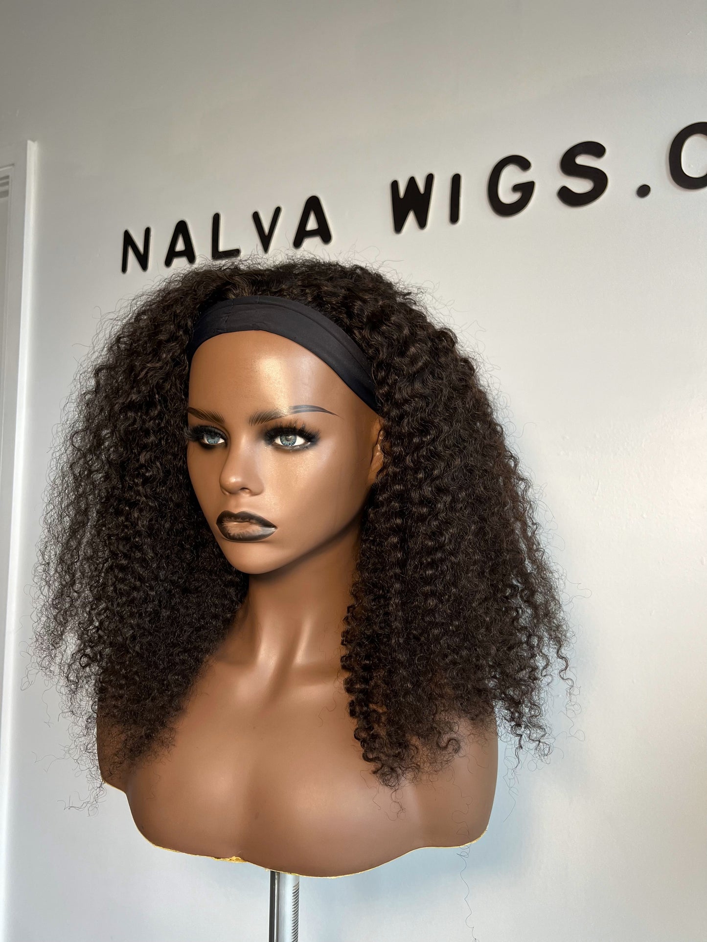 Curly Headband or Band fall wig with medium density. Light weight and beginner friendly with a built-in Spandex Headband, 2 combs, in-built adjustable elastic band and a breathable wig cap. 18" Long, Natural Dark Brown, Spandex Headband, 180% Density, Premium Virgin Human Hair. Mississauga, Ontario