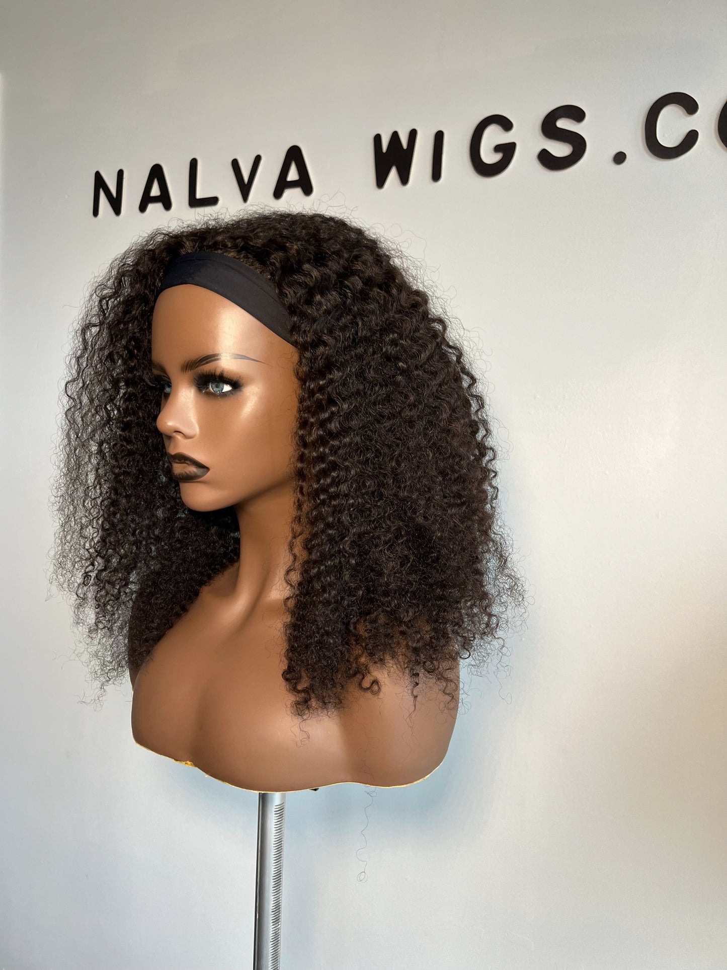 Curly Headband or Band fall wig with medium density. Light weight and beginner friendly with a built-in Spandex Headband, 2 combs, in-built adjustable elastic band and a breathable wig cap. 18" Long, Natural Dark Brown, Spandex Headband, 180% Density, Premium Virgin Human Hair. Mississauga, Ontario