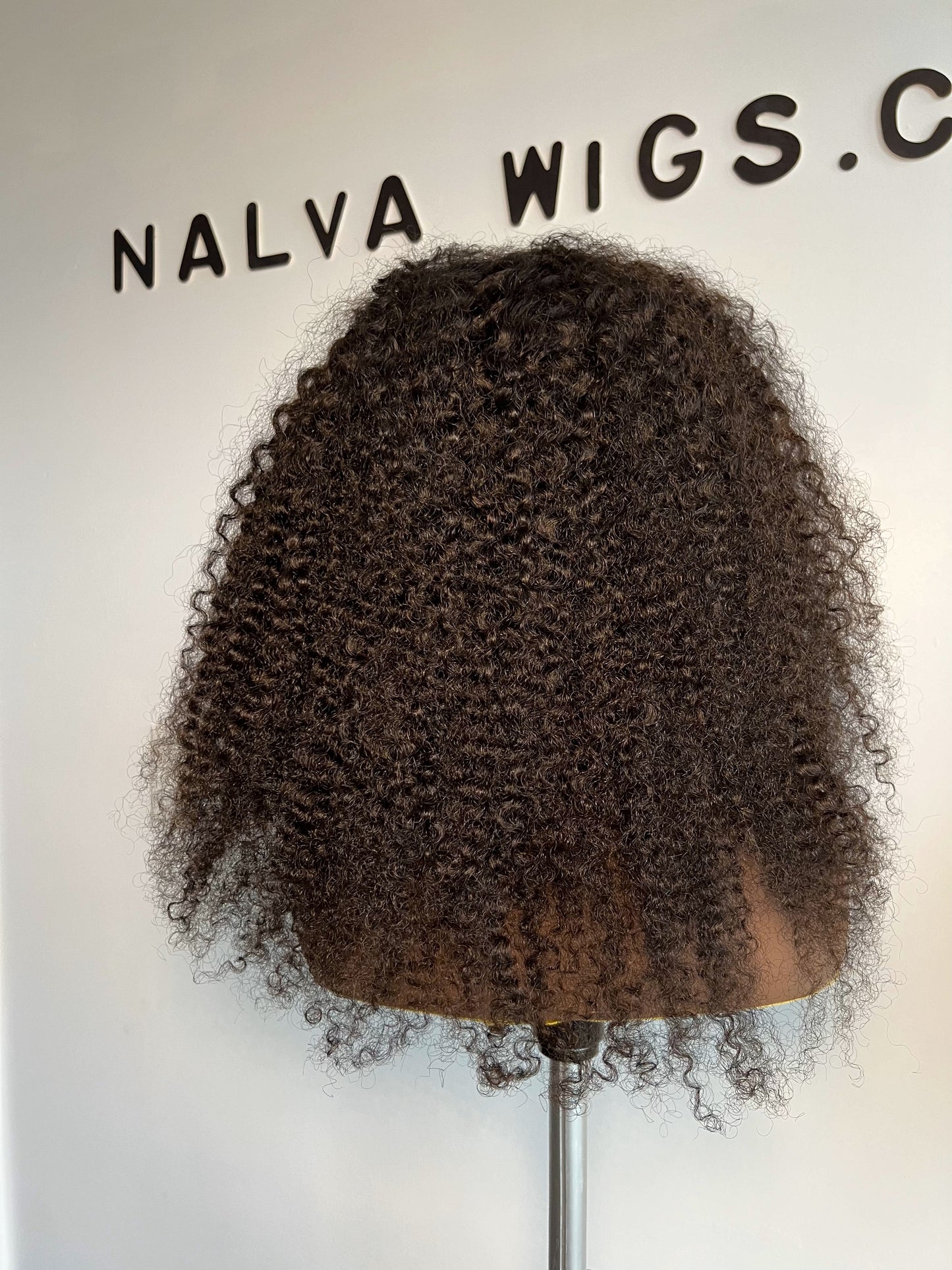 Curly Headband or Band fall wig with medium density. Light weight and beginner friendly with a built-in Spandex Headband, 2 combs, in-built adjustable elastic band and a breathable wig cap. 18" Long, Natural Dark Brown, Spandex Headband, 180% Density, Premium Virgin Human Hair. Mississauga, Ontario