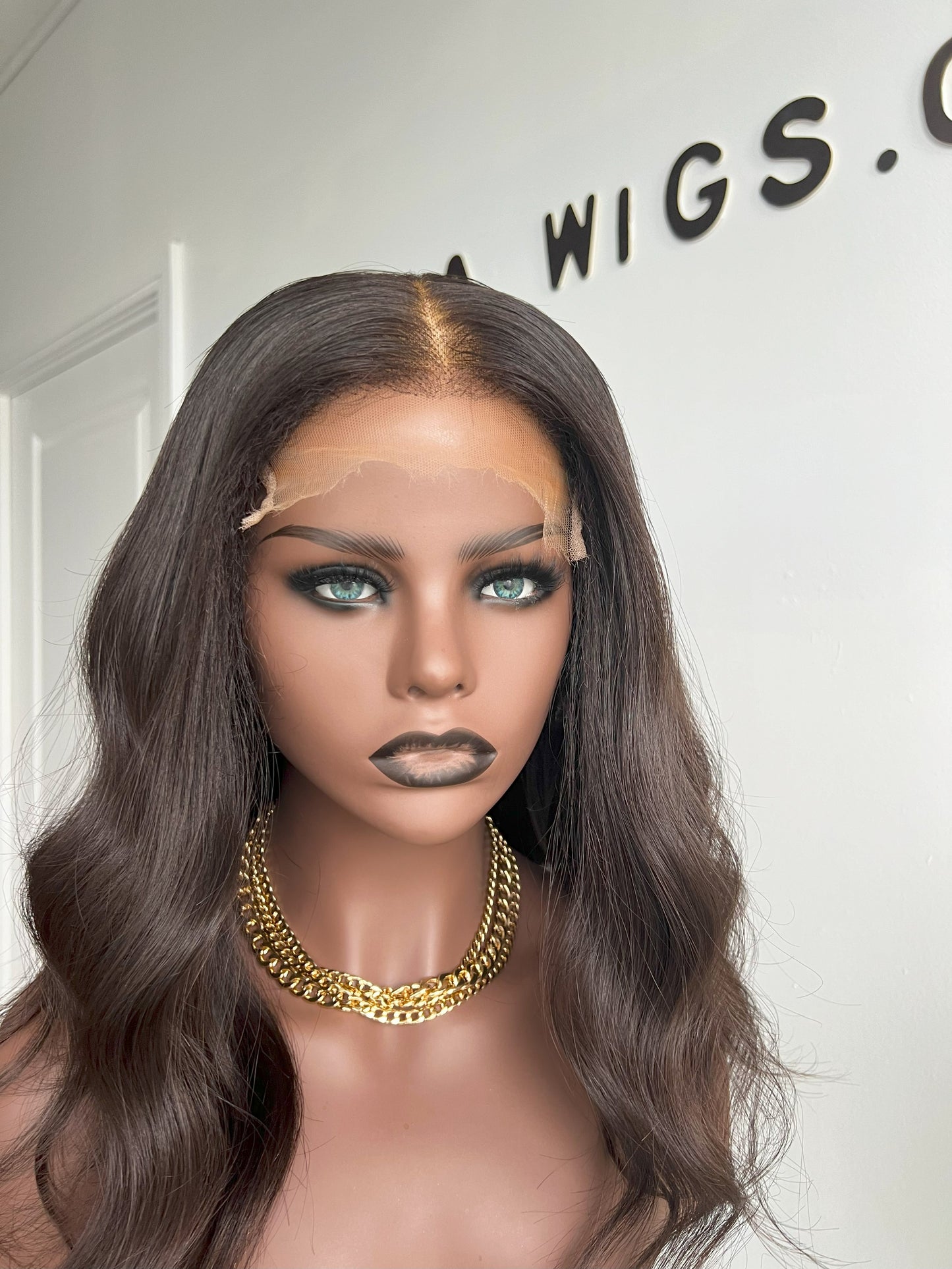 Luxury Lace Front wig crafted with Donor human hair. Light weight and beginner friendly. Details are 16” inches, Natural Dark Brown Hair Lace Closure, 180% Density. Mississauga, Ontario.