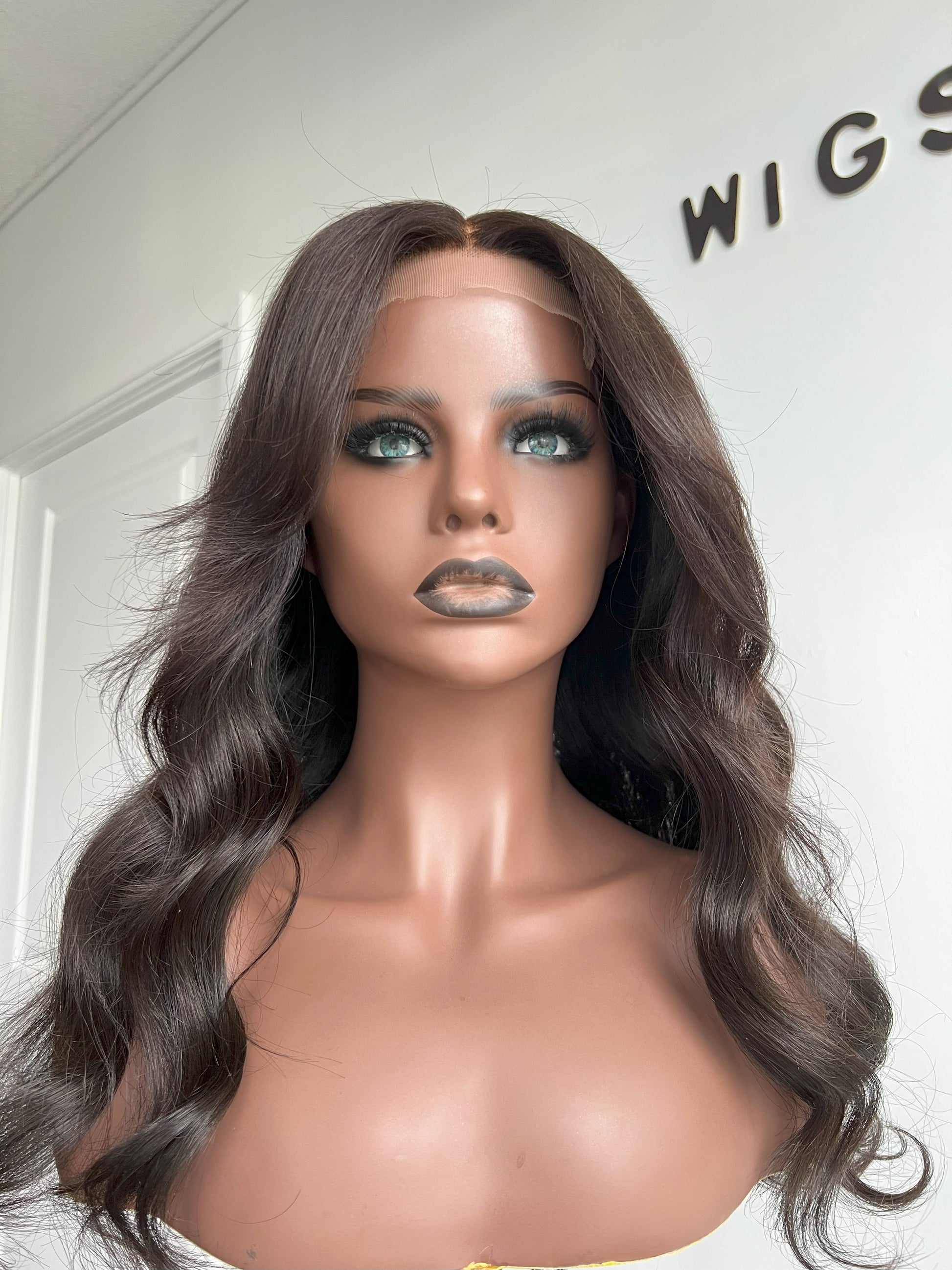 Luxury Lace Front wig crafted with virgin human hair. Light weight and beginner friendly. Details are 20” inches, Natural Dark Brown Hair Lace Closure, 180% Density. Mississauga, Ontario