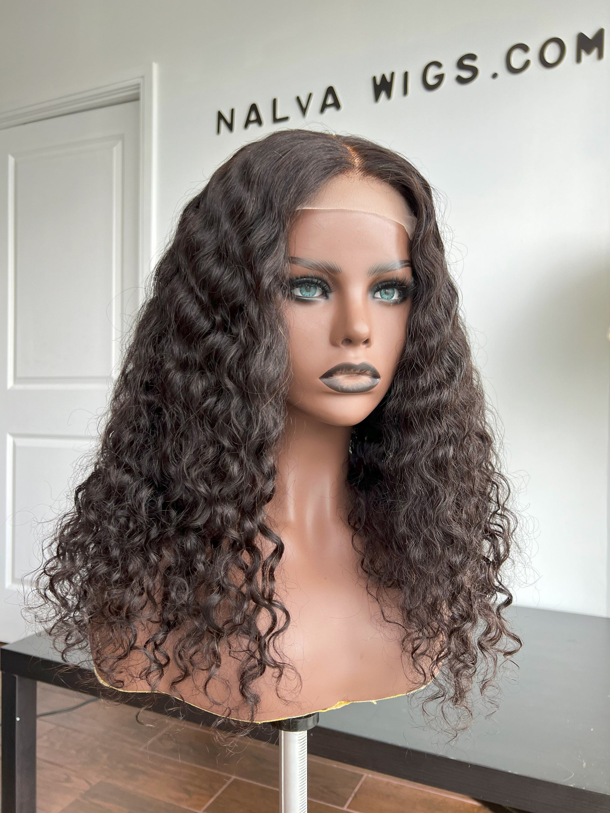 Luxury Curly Lace Front wig crafted with virgin human hair. Light weight and beginner friendly. Details are 18” inches, Natural Dark Brown Hair Lace Closure, 180% Density. Mississauga, Ontario