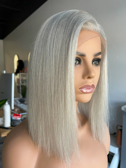 Luxury Lace Front wig crafted with Premium Virgin human hair. It is light weight and beginner friendly, 12” long with Silver Gray, 130% density, Premium Human Hair. Mississauga, Ontario