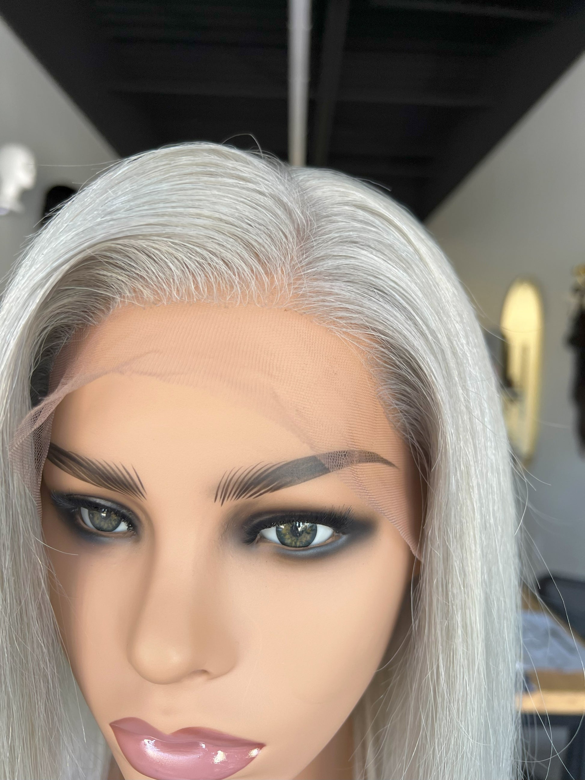 Luxury Lace Front wig crafted with Premium Virgin human hair. It is light weight and beginner friendly, 12” long with Silver Gray, 130% density, Premium Human Hair. Mississauga, Ontario